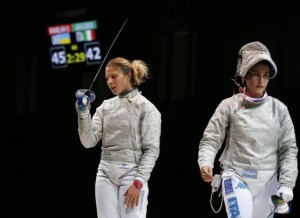 Olga Kharlan (L) of Ukraine celebrates the victory after competing against Rossella Gregorio of Italy in their women's team sabre third place match at the World Fencing Championships in Kazan July 21, 2014. REUTERS/Grigory Dukor